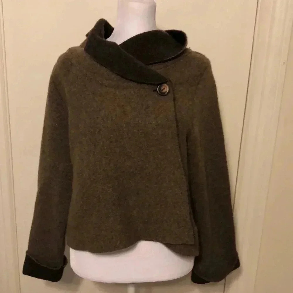ChiaraMente brown sweater with button at neck.